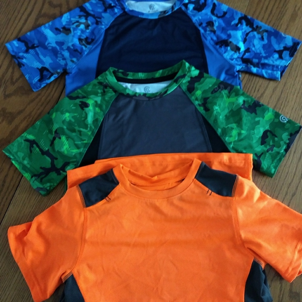 Like new. Boys Champion sportswear shirts